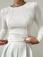 Women's slim fit ribbed top with flattering seam detail, lightweight and breathable