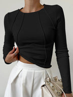 Women's slim fit ribbed top with flattering seam detail, lightweight and breathable