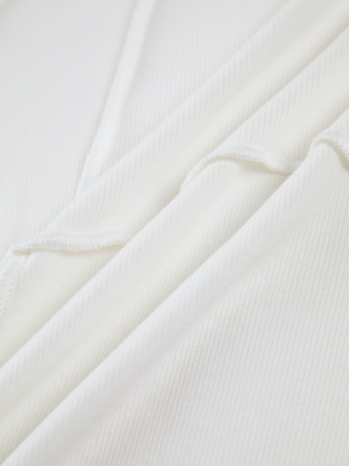 Women's slim fit ribbed top with flattering seam detail, lightweight and breathable