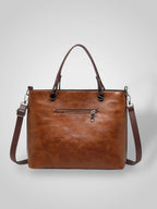 Women leather shoulder bag with magnetic snap closure and adjustable strap