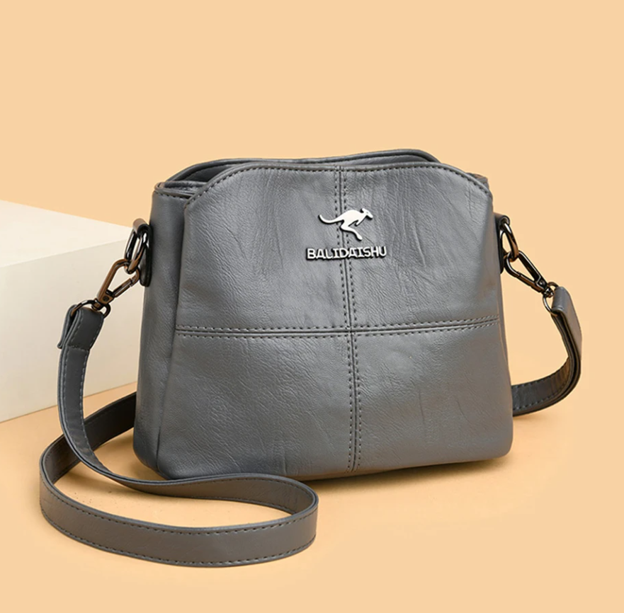 Women vegan leather handbag spacious structured design multiple colors