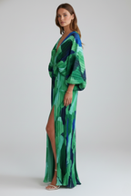 Women's long green dress with V-neckline, pleated finish and side slit