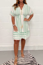 Women's boho midi dress with ethnic print, lace V-neckline and pompon sleeve details