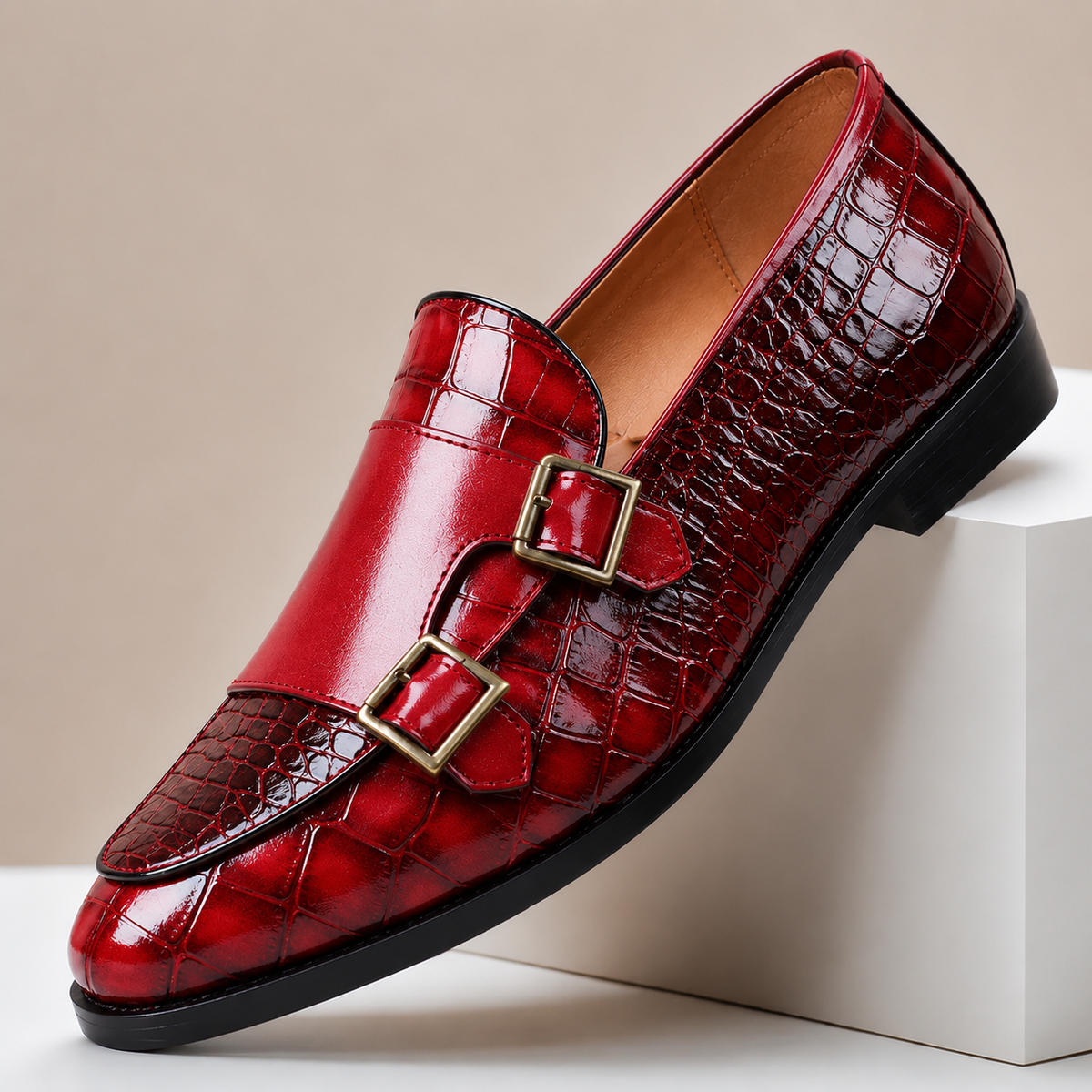 Men's leather loafers with double monk strap buckles and almond toe, crocodile-embossed finish