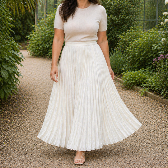 White pleated maxi skirt with flowing design