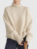 Women high collar sweater in neutral tones, slim silhouette turtleneck knitwear