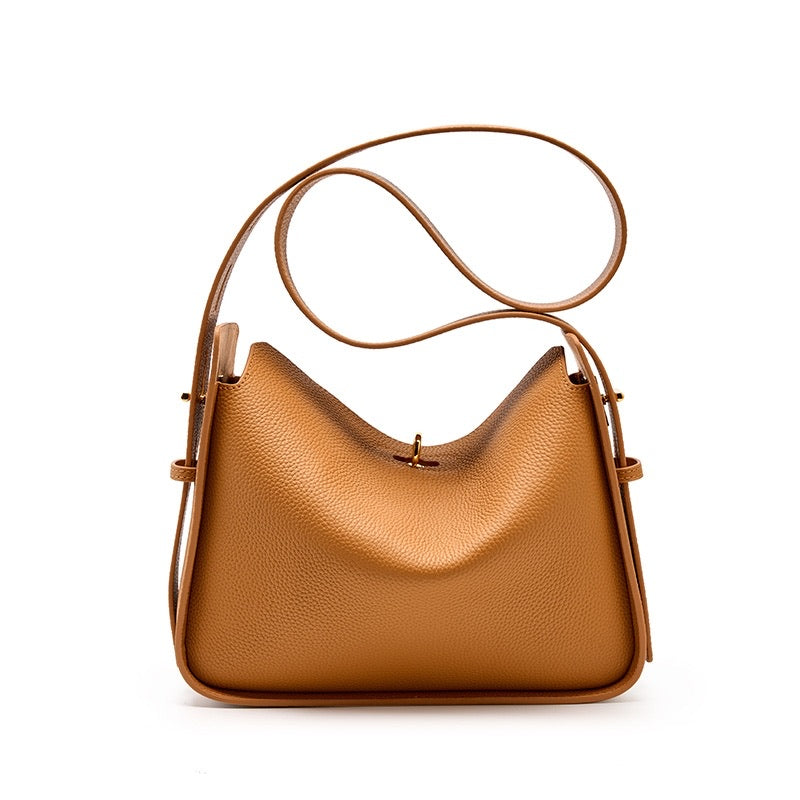 Women's genuine leather handbag with top handles, gold hardware and twist-lock closure