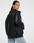 Women's oversized PU leather jacket in brown and black, relaxed fit streetwear style