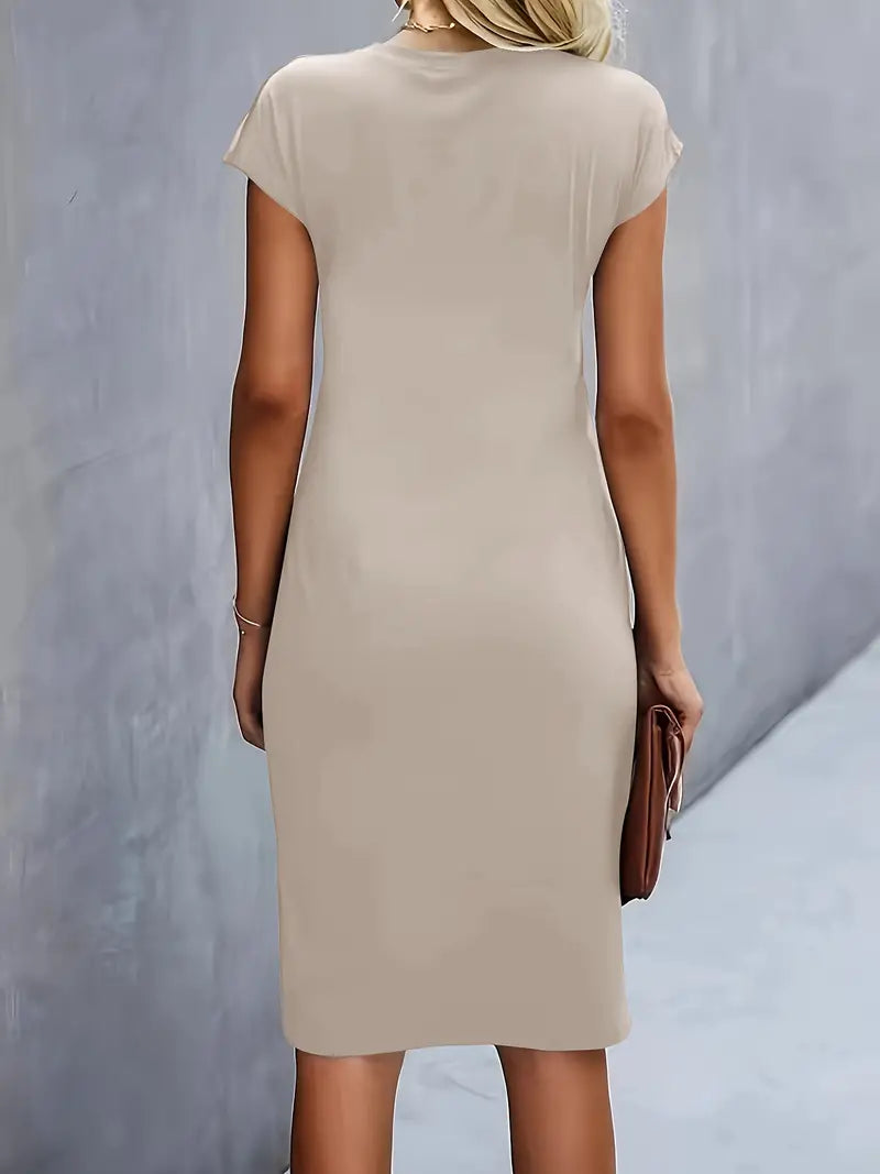 Women's midi dress with flattering silhouette and round neckline, available in 9 colours