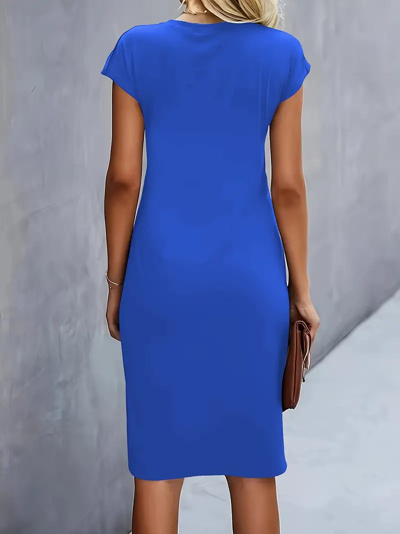 Women's midi dress with flattering silhouette and round neckline, available in 9 colours