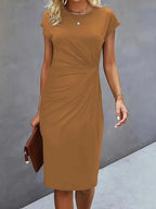 Women's midi dress with flattering silhouette and round neckline, available in 9 colours