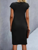 Women's midi dress with flattering silhouette and round neckline, available in 9 colours