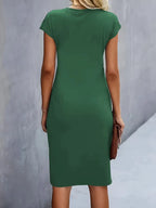 Women's midi dress with flattering silhouette and round neckline, available in 9 colours
