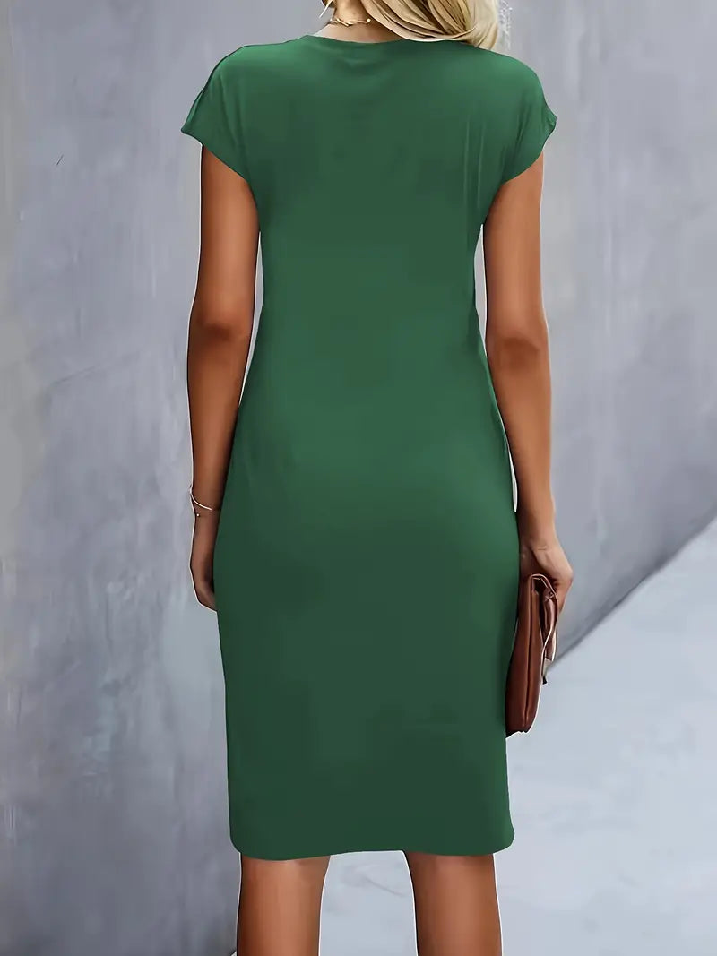 Women's midi dress with flattering silhouette and round neckline, available in 9 colours