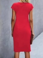 Women's midi dress with flattering silhouette and round neckline, available in 9 colours
