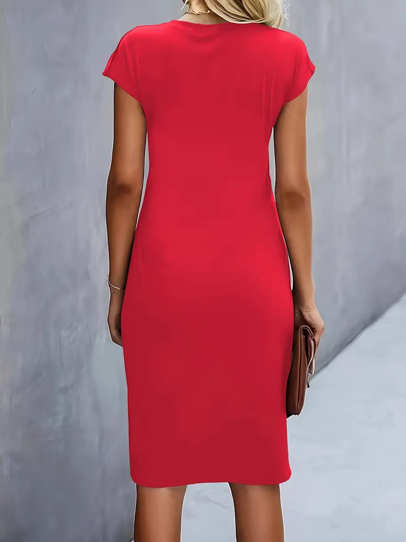 Women's midi dress with flattering silhouette and round neckline, available in 9 colours