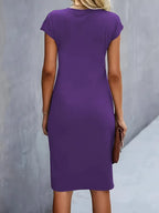 Women's midi dress with flattering silhouette and round neckline, available in 9 colours