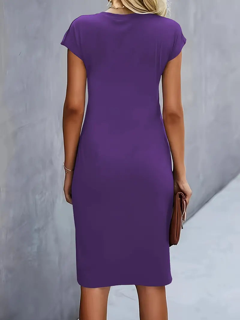 Women's midi dress with flattering silhouette and round neckline, available in 9 colours