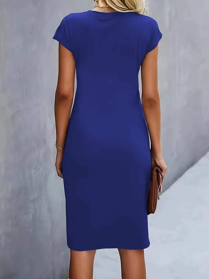 Women's midi dress with flattering silhouette and round neckline, available in 9 colours