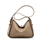 Women's genuine leather handbag with top handles, gold hardware and twist-lock closure