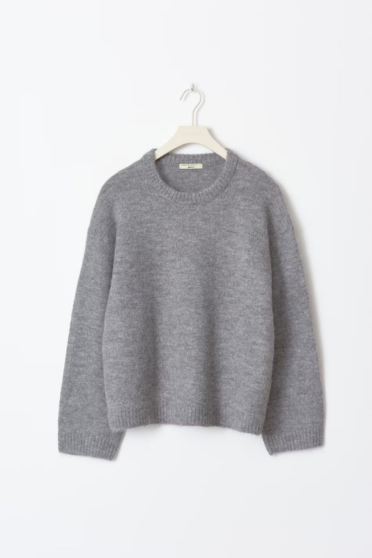 Women's oversized sweater with round neck and balloon sleeves in rose, cream and grey
