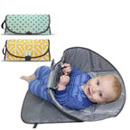 Baby changing mat with toy holder and side barriers, waterproof foldable, 0–24 months