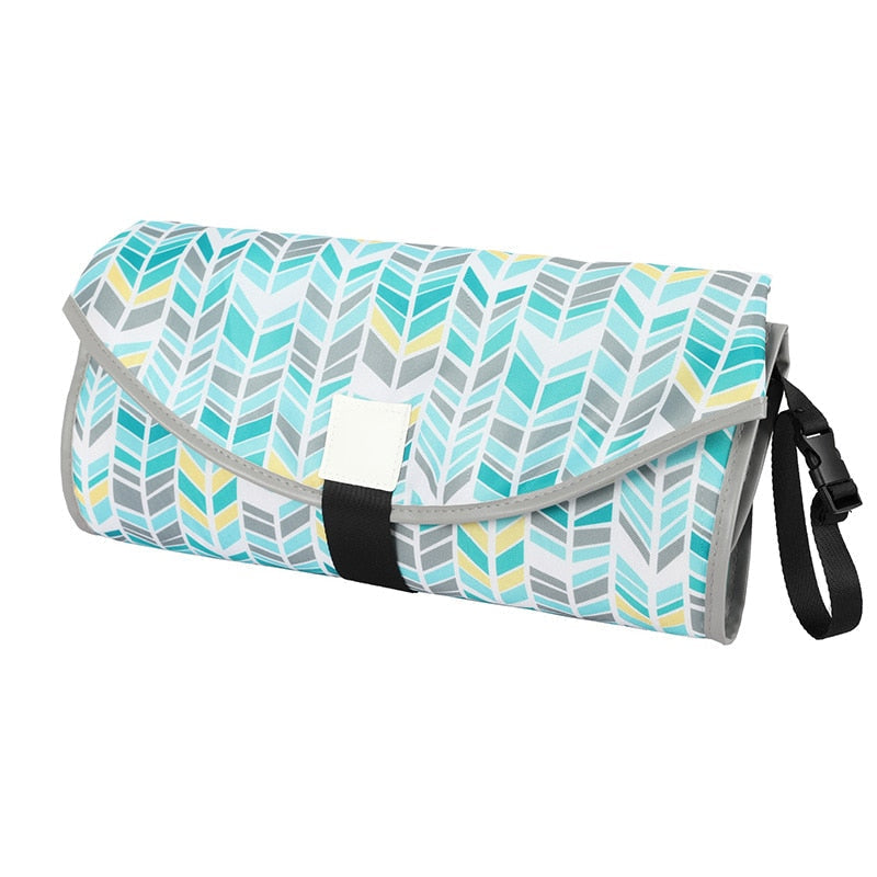 Baby changing mat with toy holder and side barriers, waterproof foldable, 0–24 months