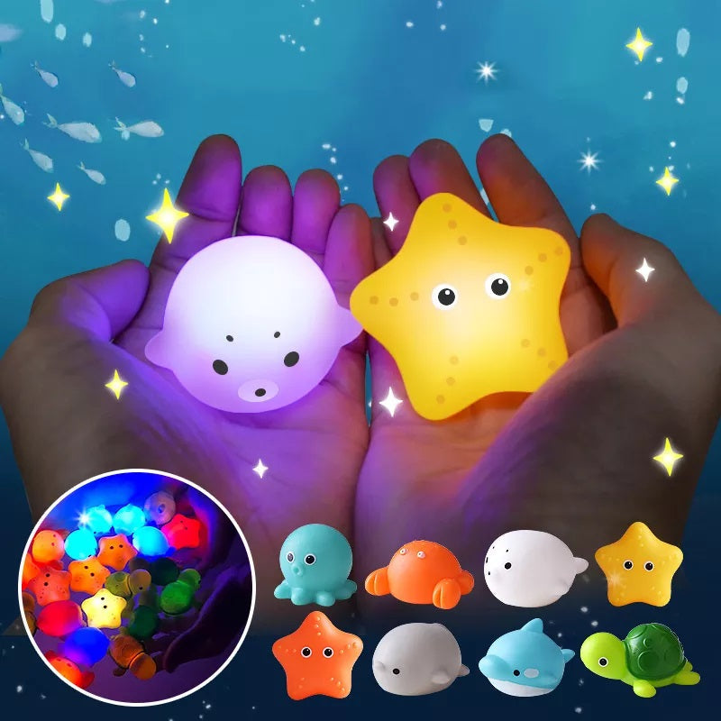 Light-up sea animal bath toys set of 4 with fishing net for kids