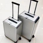 Aluminium hard shell suitcase with 360° spinner wheels, available in silver and black