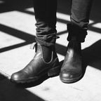 Women's leather ankle boots in grey and black, elegant timeless design for autumn and winter
