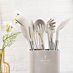12-piece silicone kitchen utensil set with stainless steel handles and storage holder