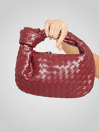 Women mini bag with woven knot top handle in eco-leather zip closure