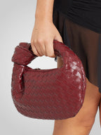 Women mini bag with woven knot top handle in eco-leather zip closure