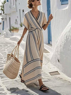Women striped maxi dress with wrap silhouette in white and apricot