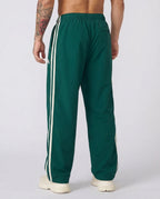 Men's striped track pants with elastic waist and zip pockets, athletic fit