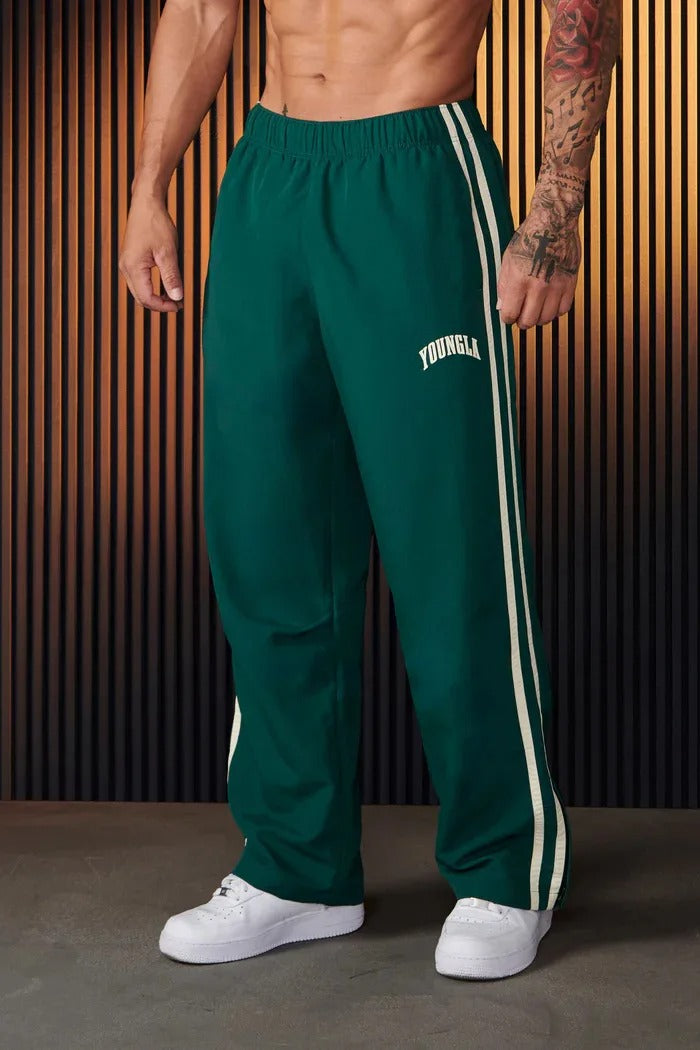 Men's striped track pants with elastic waist and zip pockets, athletic fit