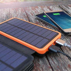 Solar power bank 25000mAh with 4 solar panels and 3 USB outputs for outdoor use