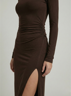 Women's ruched maxi dress in brown with high neckline and thigh-high slit