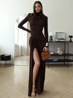 Women's ruched maxi dress in brown with high neckline and thigh-high slit