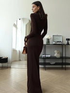 Women's ruched maxi dress in brown with high neckline and thigh-high slit