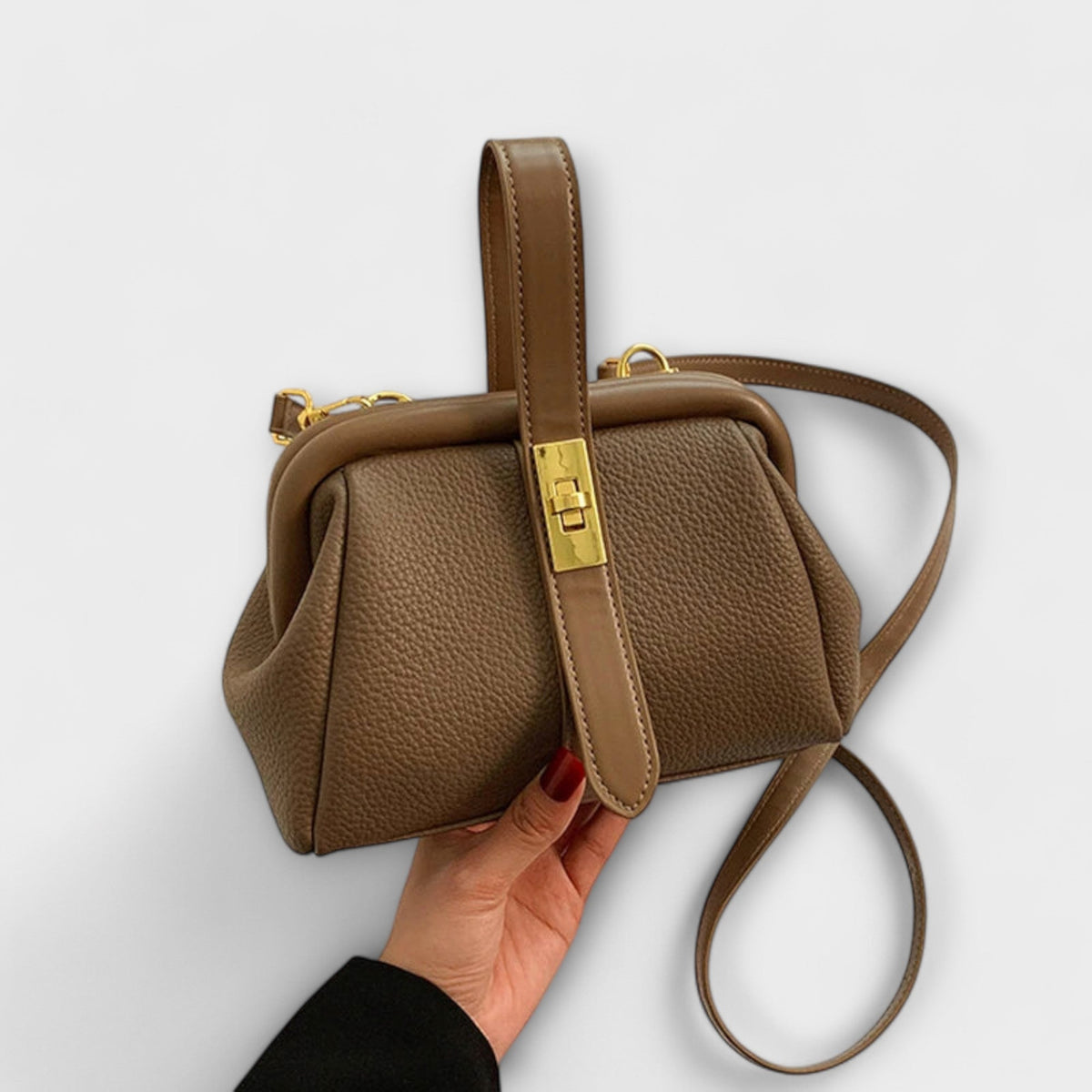 Women mini crossbody bag with twist lock closure in faux leather