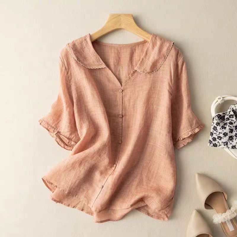 Women vintage button detail relaxed blouse in soft pastel colours relaxed fit
