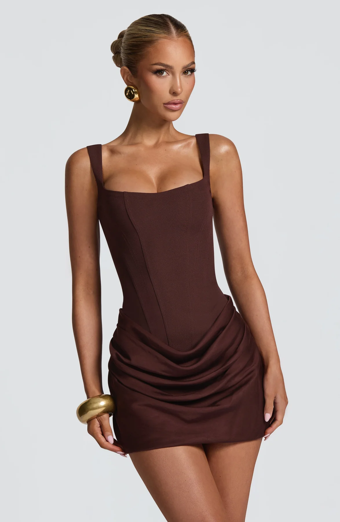 Women's mini dress with square neckline, draped skirt and lace-up back