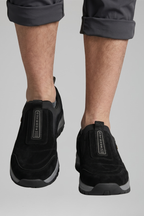 Men's slip-on walking shoes with orthopedic support and rugged treaded outsole