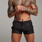 Men's swim shorts with zip pockets and drawstring waist, available in multiple colours