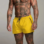 Men's swim shorts with zip pockets and drawstring waist, available in multiple colours