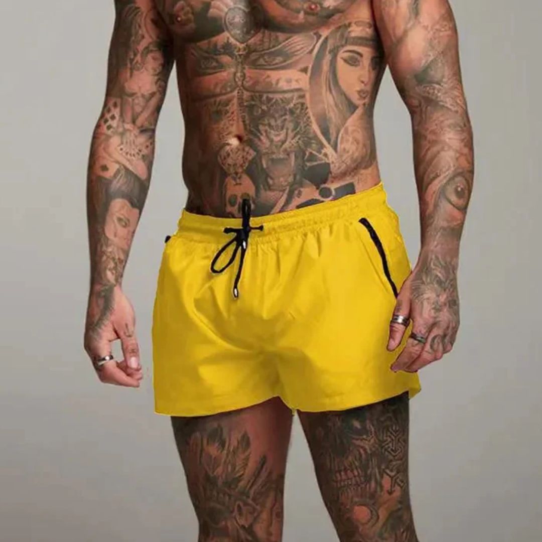 Men's swim shorts with zip pockets and drawstring waist, available in multiple colours