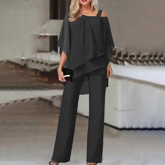 Women's two-piece set with off-shoulder top and fitted pants in vibrant colours