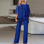 Women's two-piece set with off-shoulder top and fitted pants in vibrant colours