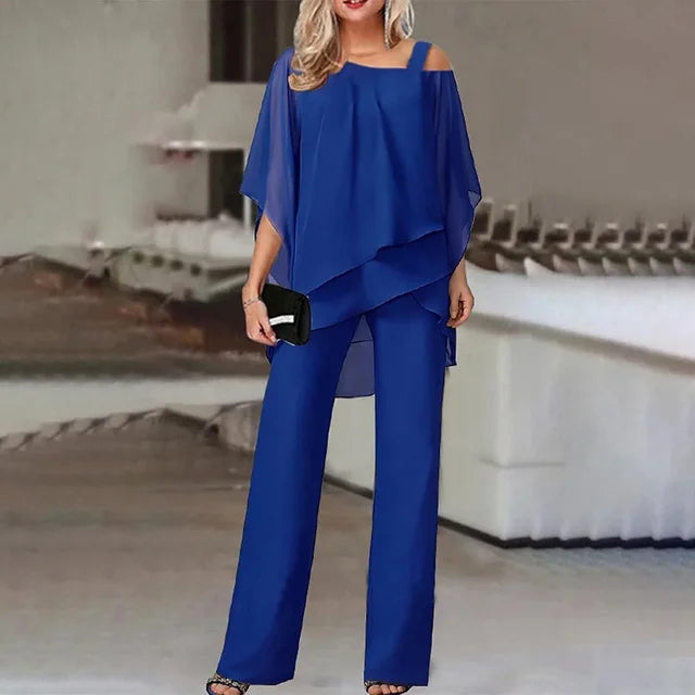 Women's two-piece set with off-shoulder top and fitted pants in vibrant colours